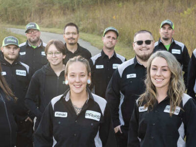 A group photo of the Pest Pros team in uniform.