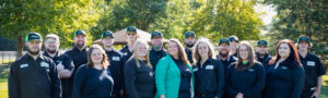 The Pest Pros of Michigan team, smiling and posing for a group photo.